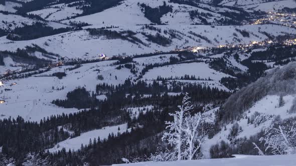 Night Village in Winter Time Lapse in Carpathian Mountains
