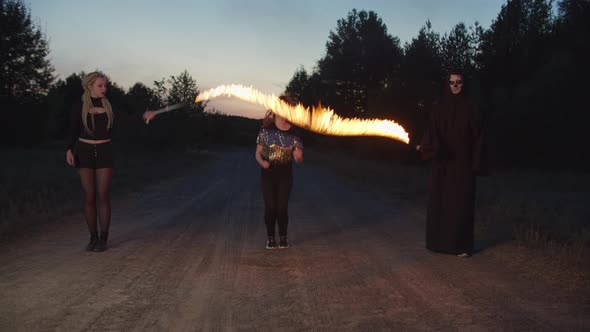 Cute Woman Jumping Burning Skipping Rope at Night