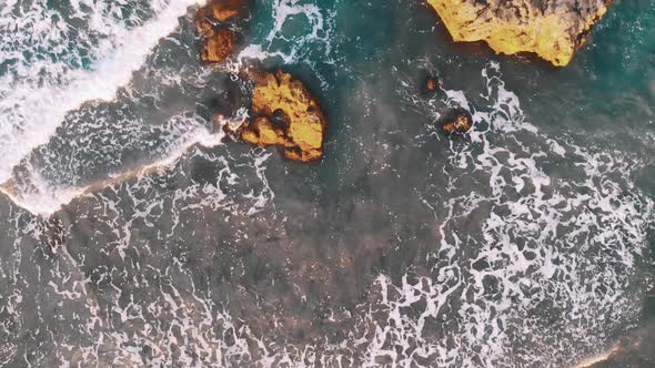 Aerial. Big Cliffs in the Atlantic Ocean at Sunset in Island Tenerife, Benijo Beach, Canary Islands