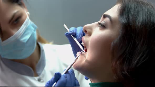 Dentist Woman with Patient.