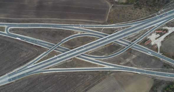 Aerial view of highway and overpass. Road junction, highway intersection top view.