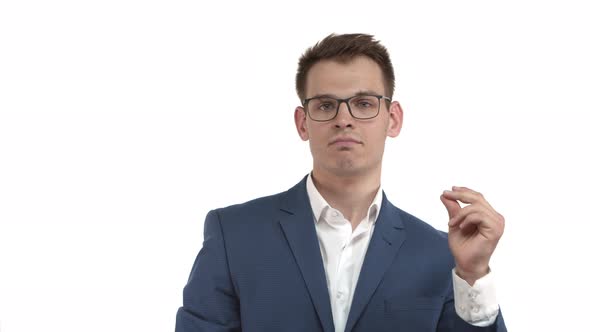 Handsome Young Businessman in Blue Suit and Glasses Vibing to Awesome Music Dancing and Snapping