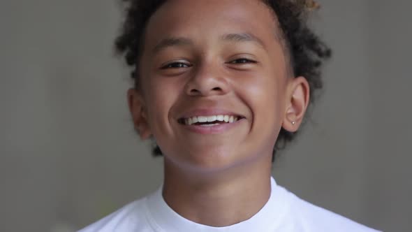 Close Up of Beautiful Mixed Race Boy Teenager Smiling Portrait Spbi