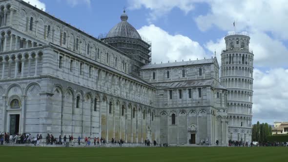 Tourists Walking Near Beautiful Cathedral and Leaning Pisa Tower in Italy