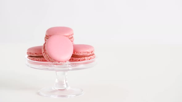 Pink Macarons on Glass Confectionery Stand