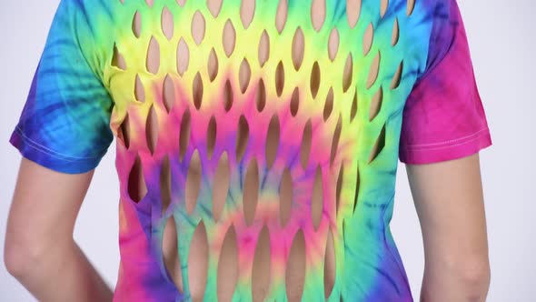 Rear View of Man Wearing Tie-dye Shirt with Holes