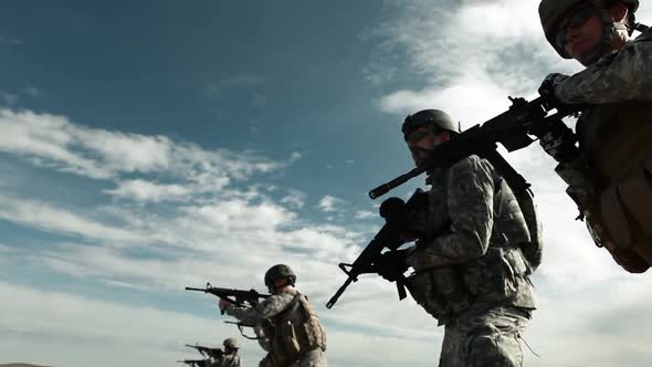 Firing line practicing readying their assault rifles