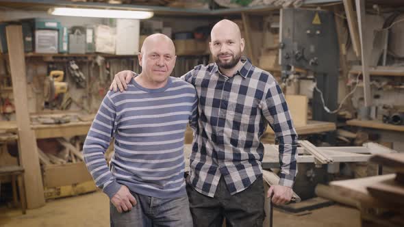 Father and Son in Their Family Carpentry Workshop