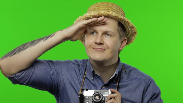 Portrait of Man Tourist Is Looking for Route on Vacation, Chroma Key
