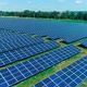 Aerial View. Flying Over The Solar Power Plant With Sun. Solar Panels And Sun. - VideoHive Item for Sale