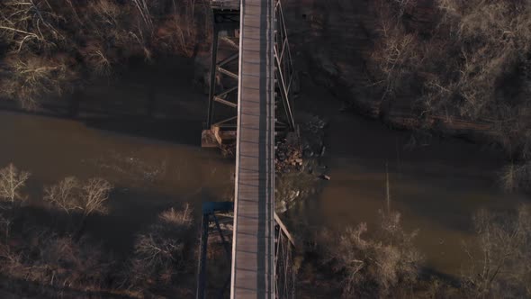 Flying directly over High Bridge Trail, a reconstructed Civil War railroad bridge in Virginia, looki