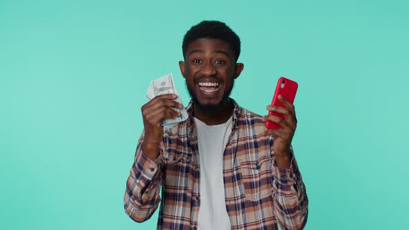 Happy African American Man Mobile Phone Display Sincerely Rejoicing Win Receiving Money Dollar Cash