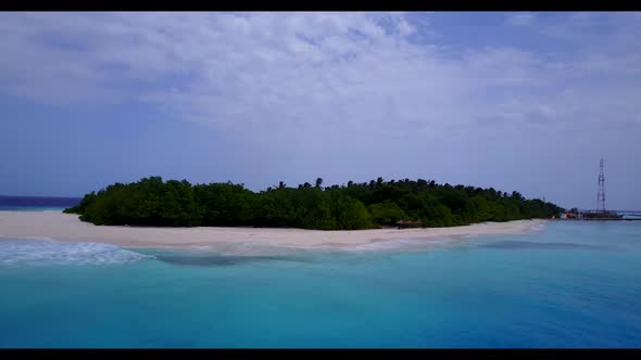 Aerial top down travel of perfect tourist beach break by shallow sea with white sand background of a