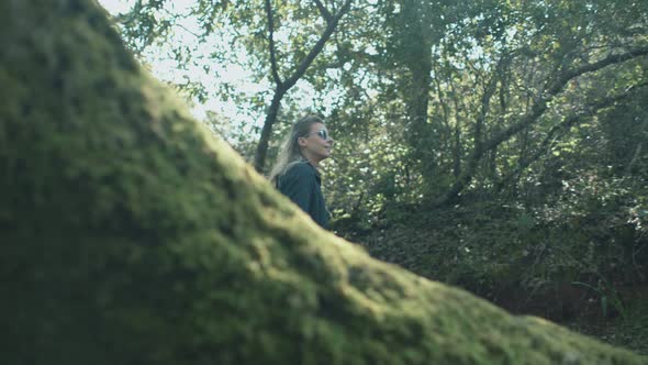 Girl Hiking In The Forest