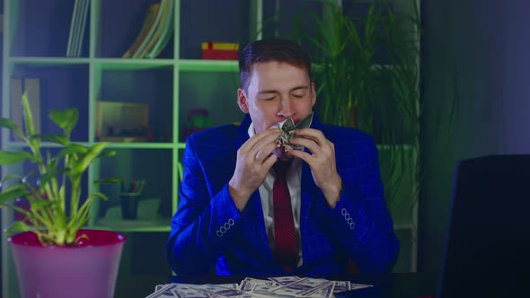 Greedy Businessman Eating Money in Office