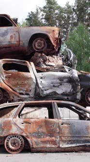 Vertical Video of the War in Ukraine  Destroyed Cars