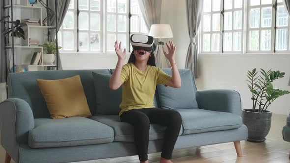 Young Girl Is Testing New Virtual Reality Headset Device