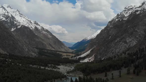 Aerial View Of Naltar Valley In Pakistan. Slow Dolly Back, Tilt Down