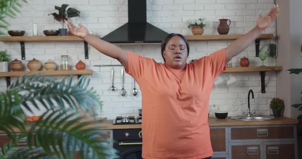 Body Positive Woman Practices Yoga Techniques Raising Arms