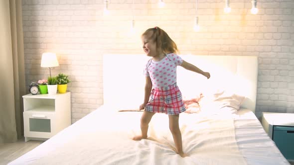 Little Girl in the Bedroom at Home