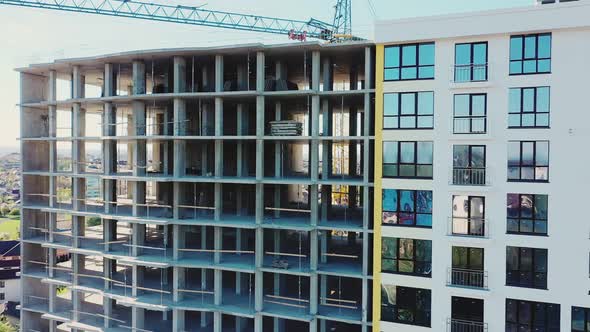 Aerial view of high residential apartment building under construction