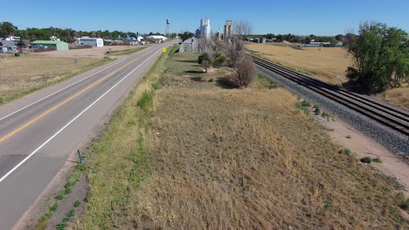 Drone rise facing north into the town of Nunn Colorado.