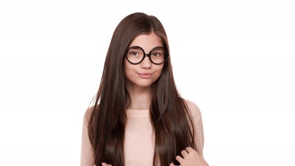 Portrait of Young Funny Woman Admiring Herself Wearing Trendy Glasses Fooling Around Making Flirty