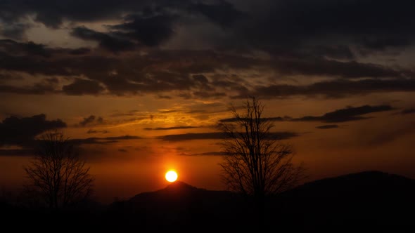 Sun Goes Behind the Mountains