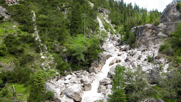 Slow Motion of Alpin Waterfalls in Summertime