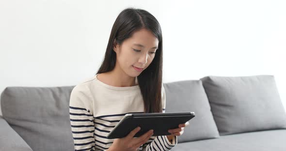 Woman look at tablet computer