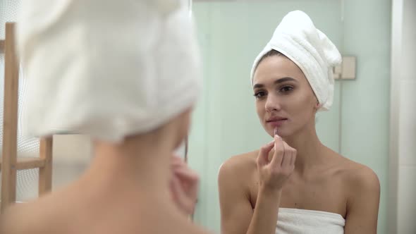 Lips Makeup. Woman Using Lip Pencil At Bathroom