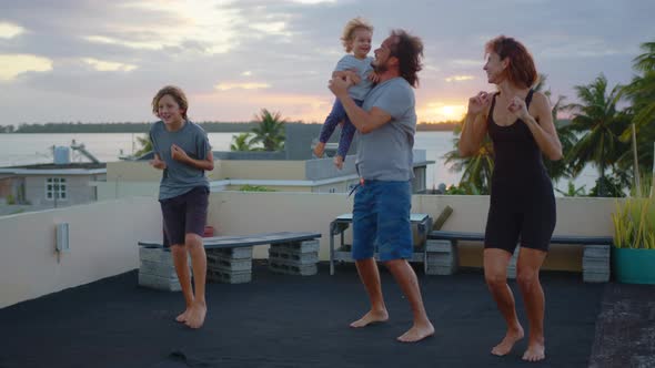 Family Dance on the Roof of the House