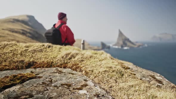 Hill's Ground Toward the Deep Blue Ocean Waters and Drangarnir Rock