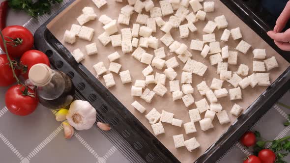 Making Caesar Salad Croutons  Sliced Toast Bread on Baking Tray