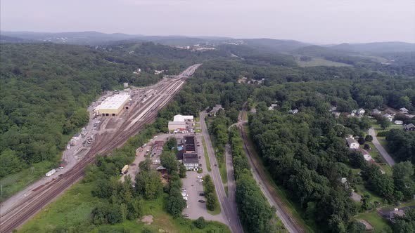 Flying Towards Brewster Train Yard and Town in  Upstate New York