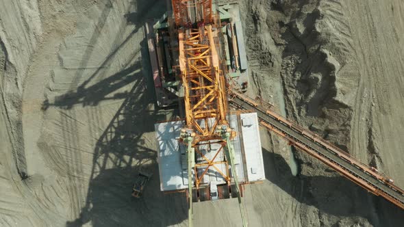 Large Orange Bucketwheel Excavator Coal Mine Aerial View