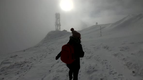 Wide Shot With A Girl Running On The Top Of The Mountain