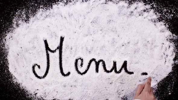 Salt Writing on Black Surface   Menu