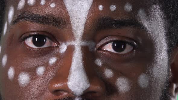 Face of an African American Man with an Ethnic White Pattern