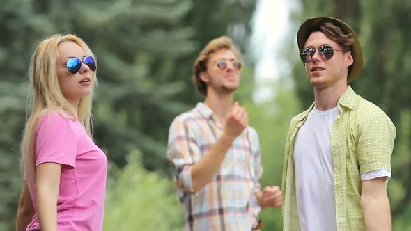 Youth Listening to Music, Dancing and Chilling Out at Summer Open-Air Festival