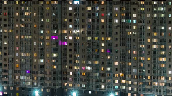 windows of buildings in the night city