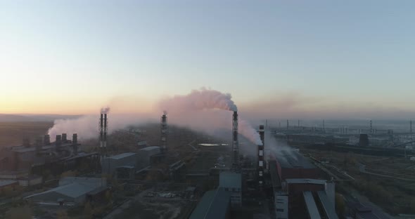 Thick Smoke Plumes Aerial View Emission To Atmosphere From Industrial Pipes