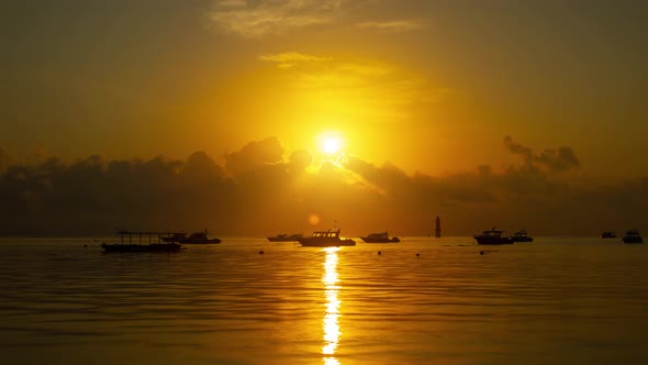 Time lapse of the sun rising over the ocean in Bali