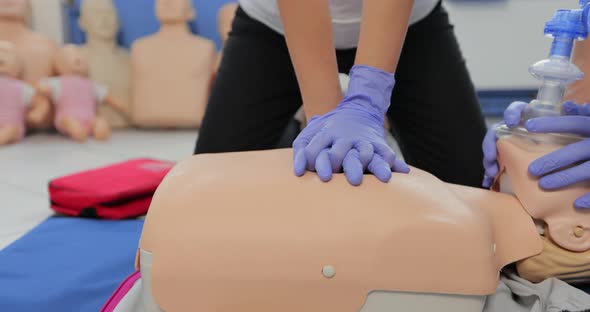 CPR Training Using and an AED and Bag Mask Valve on an Adult Training Manikin