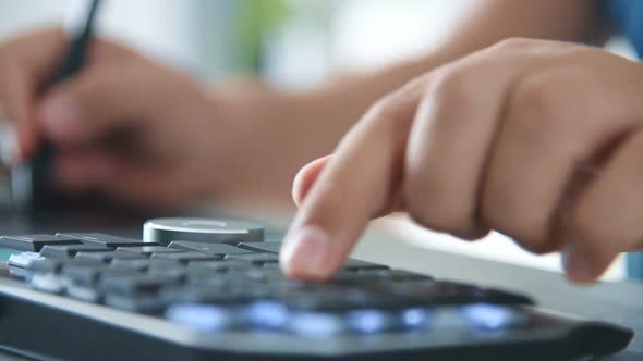 Hand Working With Navigation Control Wheel Keyboard