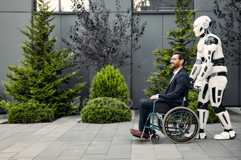 A robot carries a wheelchair with a sick man
