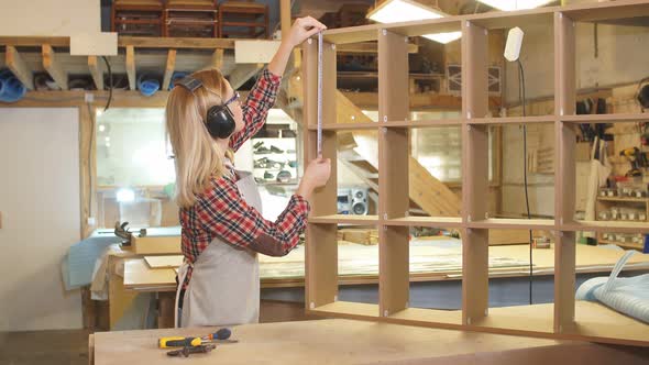 Confident Woman Work As Woodworker in Workshop