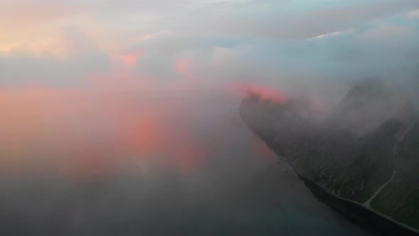 Aerial view of the coastline at sunset, Unalaska, Alaska, United States.