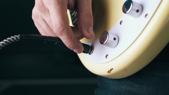 Professional Bassist Takes Quarter-inch Jack From Guitar