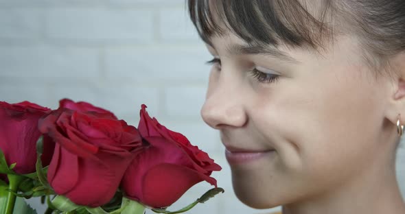 Pleasant Smiling Girl with Flowers